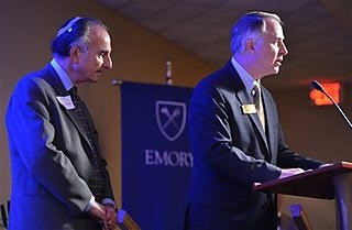 Emory president James Wagner, right, apologized for the dental school’s era of anti-Semitism that was depicted in a documentary largely based on interviews by former student Perry Brickman, left.