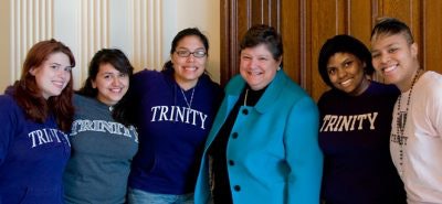 Trinity University President Patricia McGuire with students.
