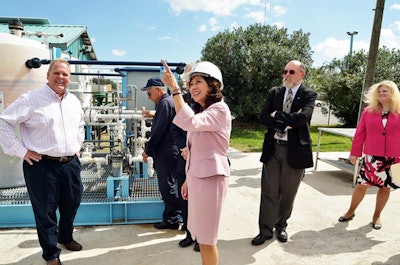 Labor Secretary Hilda Solis visits a factory to promote the department’s new workforce development initiative.