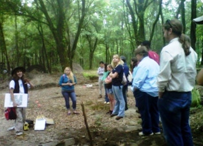 Archaeologist Rita Elliott discusses the Miller Plantation with students from Georgia Southern University.