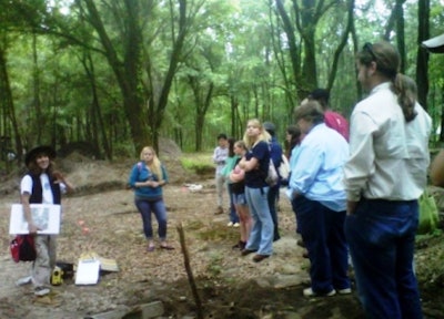 Archaeologist Rita Elliott discusses the Miller Plantation with students from Georgia Southern University.