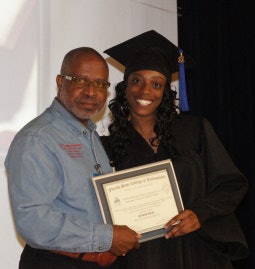 Professor Timothy Sinclair with Quiana Neal, who graduated from the Brownfields/Environmental Workforce Development and Job Training Program.
