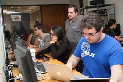 Miami Dade College’s computer research lab serves as a resource where students are encouraged to apply their research skills to solve real-life problems.