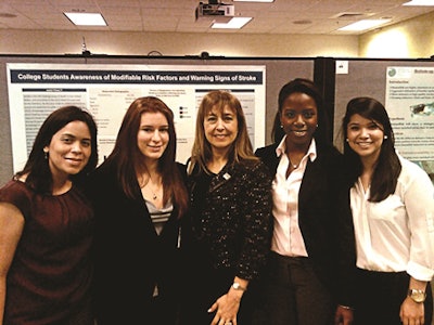 Dr. Irma Becerra-Fernandez, center, said the inaugural Life Sciences South Florida STEM Research Symposium for students was a hit.