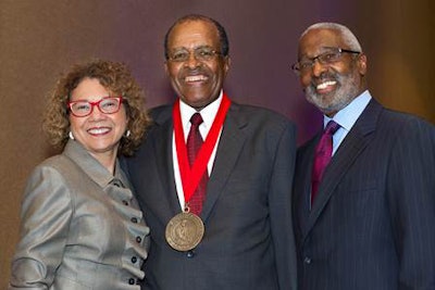 Dr. Mildred Garcia (left) and Dr. Benjamin F. Quillian (right) present the 2014 Dr. John Hope Franklin award to Dr. James Rosser. (Photo by Lauren Radack)