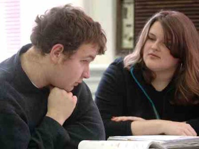 An autism student receives tutoring.