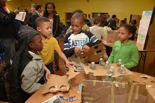 Students from Arlington Elementary/Middle School participate in a STEM Recognition event at the 29th Street Community Center that showcased STEM achievement. (Photo courtesy of Johns Hopkins University)