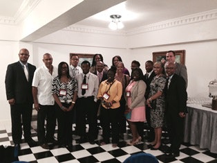 Charlotte High School students gather with keynote speakers Drs. Pedro Noguera and Gloria Ladson-Billings at the International Conference on Urban Education. Dr. Chance W. Lewis, right, is the conference organizer.