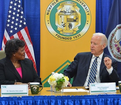 At Norfolk State University, Provost Sandra J. DeLoatch listens to Vice President Joe Biden. (photo courtesy of Norfolk State University)