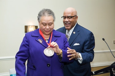 Dr. Belle S. Wheelan is presented the Dr. John Hope Franklin Award by longtime friend and colleague Dr. Walter G. Bumphus. (Photo by Ron Aira)