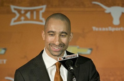 Coach Shaka Smart speaks during a news conference at the University of Texas-Austin.