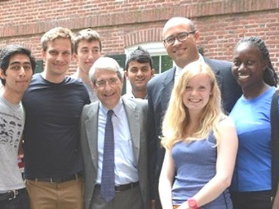 Yale University President Peter Salovey (fourth from left) and Yale College Dean Jonathan Holloway (third from right) pose with Class of 2019 students. (Photo by Michael Masland; courtesy of Yale University)