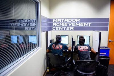 Two student-athletes study in the Matador Achievement Center at California State University, Northridge. (Photo courtesy of Braden Villanueva/CSUN Athletics)