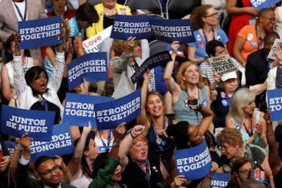 Delegates cheer during the first day of the Democratic National Convention in Philadelphia, Monday, July 25, 2016. (AP Photo/Mary Altaffer)