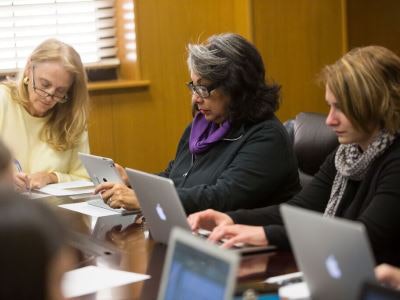 Female professors at Texas Tech University work on their research during their weekly meeting with the Women’s Faculty Writing Program. (Photo courtesy of Texas Tech University)