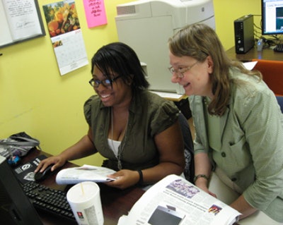 Dr. Judith G. Curtis, right, has served as faculty adviser to the University of North Carolina at Pembroke newspaper for more than a decade.