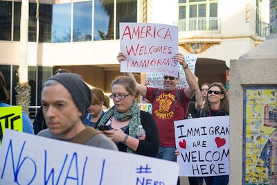 Protest from Pax South attendees following President Trump’s executive order on immigration. Photo courtesy of Daniel Cuadra, Creative Commons license.