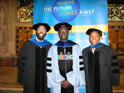 Dr. Christopher Emdin (left), Dr. Edmund Adjapong (center) and Dr. Khalil Gibran Muhammad, who received the Medal for Distinguished Service, celebrate on Wednesday.