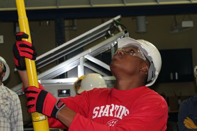 Tyrone Joseph practices his skills during his internship with FPL at IRSC’s Brown Center.