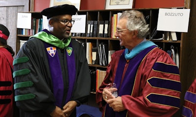 Hobart and William Smith Colleges President Gregory J. Vincent chats with Chair of the Board of Trustees Thomas S. Bozzuto.