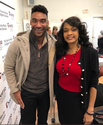 Dr. Lezli Baskerville with roundtable attendee Zeke Thomas.