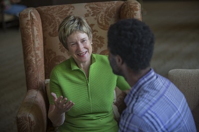 Dr. Sharon D. Herzberger, president of Whittier College, talks with a student.