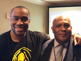 Temple University professor Dr. Marc Lamont Hill with Dr. Jamal Watson, executive editor of Diverse following panel discussion at National Action Network convention.
