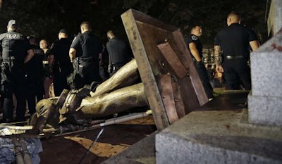 ‘Silent Sam’ after being toppled to the ground by UNC students.