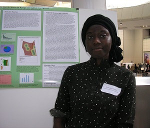 A student presenting research at AMNH.