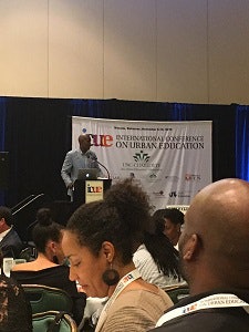Dr. Tyrone C. Howard speaking at the International Conference on Urban Education.