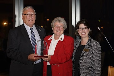 Jim Harteis (left) with fellow alum Patricia Hilton (center) and university president Dr. Maria Gallo (Photo courtesy of Delaware State University).