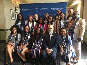UNCF’s Dr. Michael Lomax gathers with the Columbia HBCU Fellows.