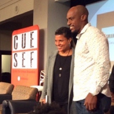 “New Jim Crow” author Michelle Alexander poses with a former prison inmate.