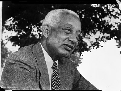 Dr. Alain LeRoy Locke, on the Howard University campus where he taught for most of his career. He envisioned Howard as a center for Black intellectuals and for the study of race and culture.