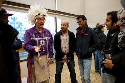 Perry Ground, second from left, helps RIT celebrate Native American Heritage Month at an event in 2012.