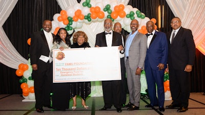 FAMU NAA President Col. Gregory Clark, VP University Advancement Shawnta Friday-Stroud, Ph.D., Event Chair Doris Hicks, President Larry Robinson, Ph.D., VP Student Affairs William E. Hudson, Jr., Ph.D., Jemal Gibson, former NAA President Tommy Mitchell and FAMU BOT Chairman Kelvin Lawson.