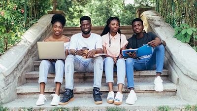 Group Of Students On Steps Double