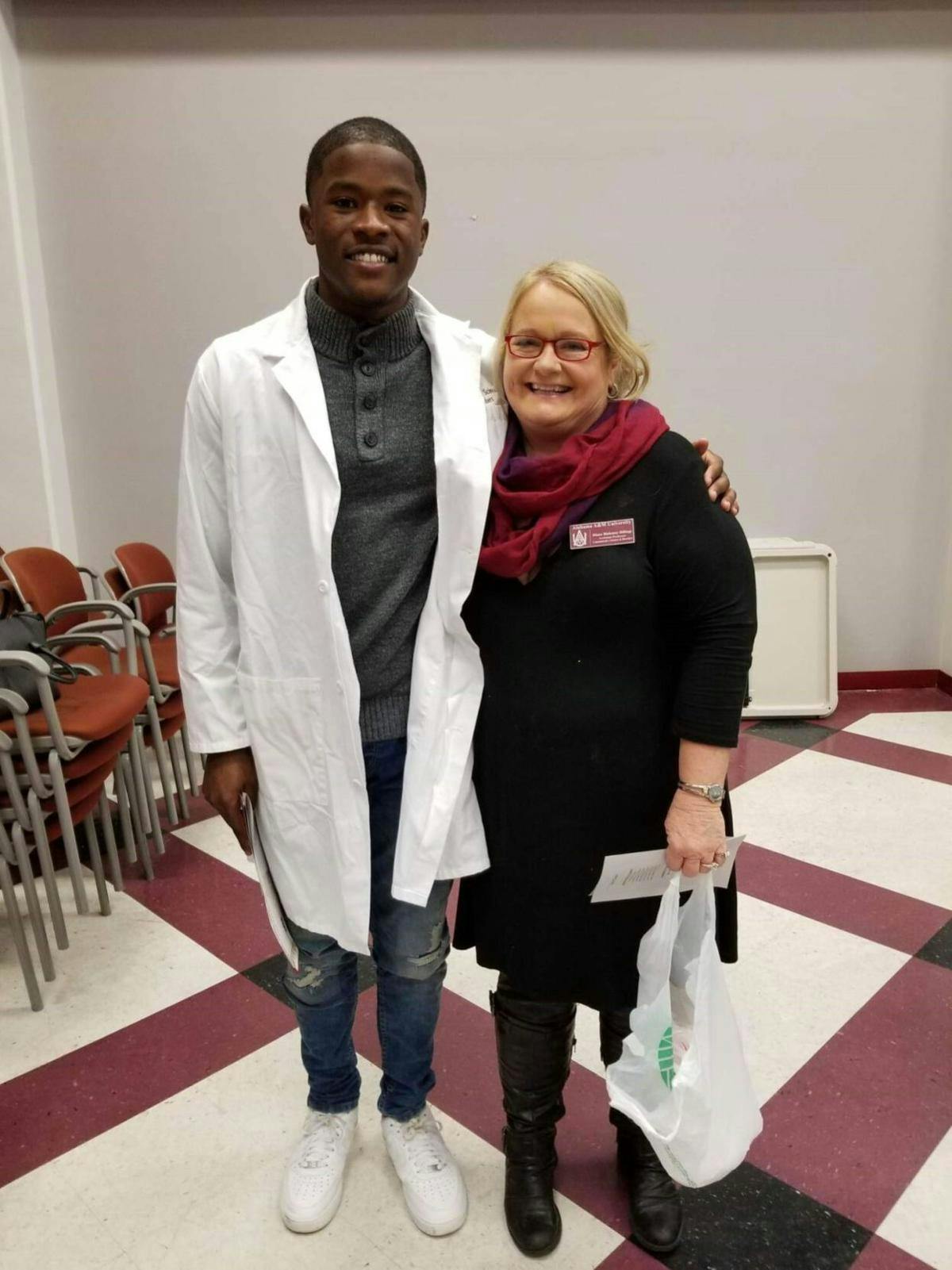 Dr. Diane Jeanne Blakeney-Billings and her former student, Jelani Day.
