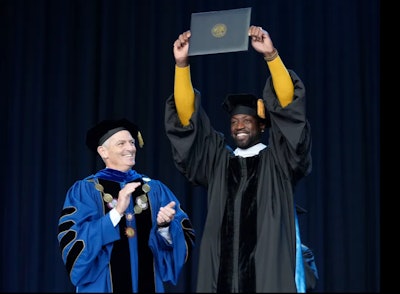 Marquette University President Michael Lovell and Dwyane Wade