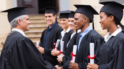 Male Professor Shaking College Graduate Hands 750x420 (1)