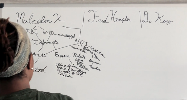 In the film Betrayal of a Nation, Brandi Webb explores the connections between the FBI and the NYPD in the assassinations of Fred Hampton, Malcolm X, and Rev. Dr. Martin Luther King, Jr.