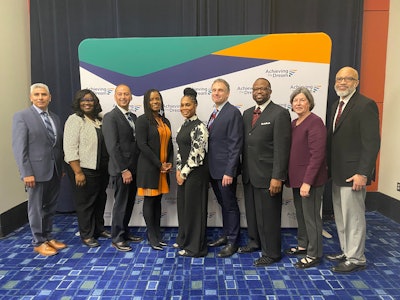 Presidents of the five City Colleges of Chicago accepted in the inaugural Accelerating Equitable Outcomes program stand with other Achieving the Dream network presidents and ATD President Dr. Karen A. Stout.