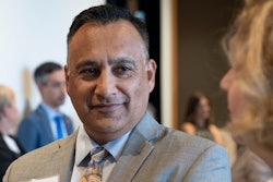 Higher education leaders say Dr. Steven R. Gonzales (center) brings a unique-but-relatable perspective to serving first-generation and underprivileged students as chancellor of the Maricopa County Community College District.