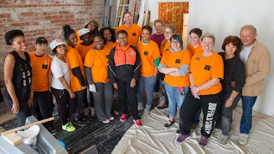 Dr. Katherine Conway-Turner, center, takes part in the 2014 Inaugural Bengals Dare to Care Day.