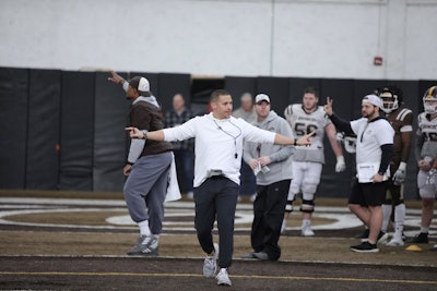 WMU Coach Lance Taylor leads practice