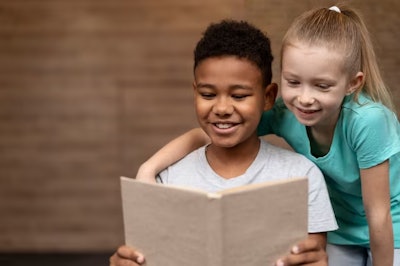 Medium Shot Children Reading Together 23 2149199879