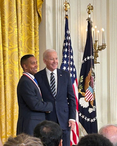 Dr. Juan Gilbert receives the National Medal of Technology and Innovation from President Biden.