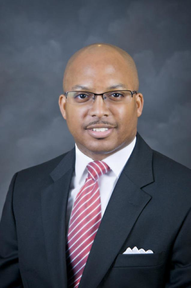 Dr. Marcus L. Thompson