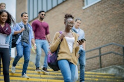 College Students Walking Down Stairs