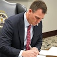 Oklahoma Gov. Kevin Stitt signs an executive order to limit state-funded diversity programs in the state.